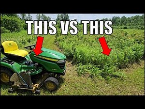 Clearing a meadow with a John Deere x380 riding mower