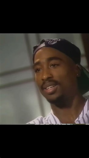 Tupac Shakur: Fierce on Stage, Kind Soul Within #TupacShakur #HipHopLegend #MusicHistory #RapIcon