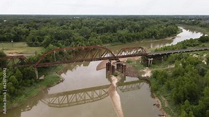 Old Railroad Bridge Over Muddy Brazos River In Texas