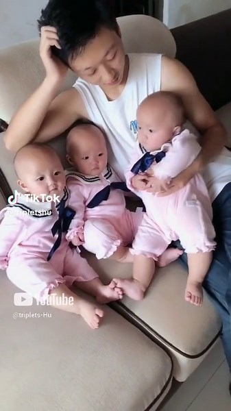 Holding Identical Triplets: A Challenging Yet Fun Experience