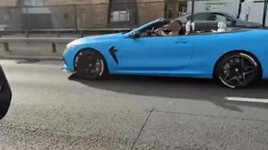 Shock moment convoy of wedding guests leap out supercar in road rage row