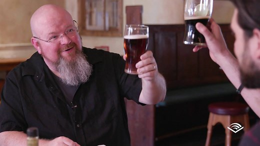 Author Kevin Hearne and narrator Luke Daniels discussed their hit series, the 'Iron Druid Chronicles,' over some fish and chips… and a Guinness or two. Watch the full conversation at adbl.co/IronDruidConvo. Cheers! | Audible