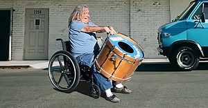 Handicapped man answers "drummer wanted" ad and impresses others.