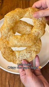 Part 7-Rice Paper Sesame “Bagel”Light,crispy and addictive. Who knew rice paper could do this? It turns golden, crackly, and holds all your favorite fillings. Easy breakfast or lunch idea to try. Would you try this? Ingredients: • 4 small rice paper sheets (about 6-inch diameter) • 2 eggs, whisked • Sesame seeds (as much as you like) • Oil spray • Parchment paper Instructions: 1. Dip one rice paper sheet into the egg wash until fully coated.1-2 seconds 2. Dip a second sheet and place it directly