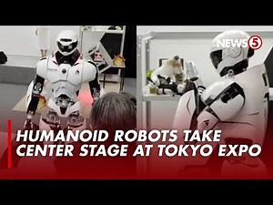 Robots 'save cats' and dance smoothly at Japan robot expo