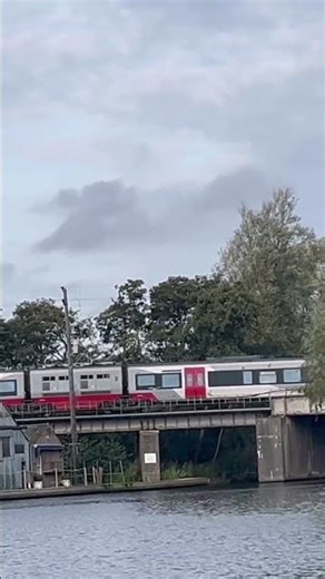 Greater anglier DMU thrashes over Wroxham bridge