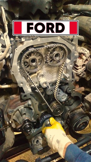 Wrong Oil = Engine Damage? EcoBlue Timing Job. • In this video we perform a timing belt replacement on a 2018 Ford Transit equipped with the 2.0 EcoBlue diesel engine. This is a rear-wheel-drive version with a longitudinally mounted engine, so the easiest way to gain proper access is to remove the entire front end - bumper, headlights, and radiator assembly. • Behind the front one-time-use engine cover sits the timing belt, which runs in oil. We replace the belt and tensioner, install a new fron