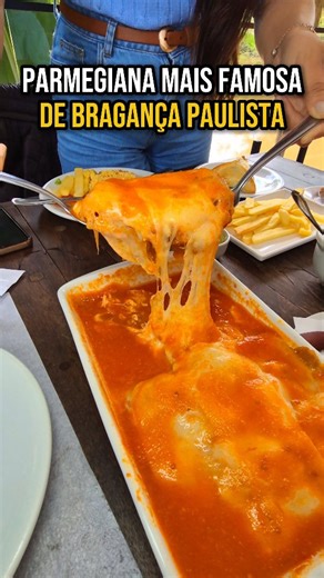 Achei Em Bragança - Divulgação | A PARMEGIANA MAIS FAMOSA DE BRAGANÇA PAULISTA 😱 Essa é de Contra-filé Angus, feita artesanalmente, lotada de queijo e molho. Acompanha... | Instagram