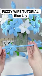 Fuzzy Wire Flower Tutorial (Blue Lily) #fuzzywireflower #pipecleanerflowers #tutorial #tutorialsvideos #flowers #flowermaking #lily #reelsvideoシ #reelsviralシ #trendingreelsvideo #trendingvideo #trendingnow #viralvideo | It's all about Arts