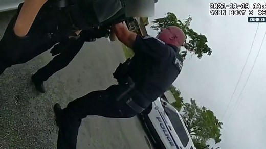 Body camera video shows a police sergeant grabbing a fellow officer by the neck