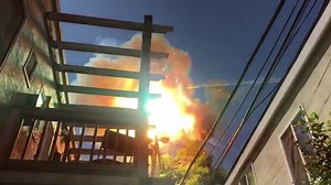 A Pair of Mylar Balloons Get Caught In Energized Power Lines Causing a Dramatic Explosion