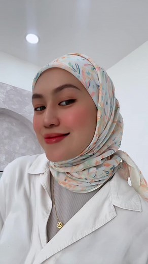 Embracing the art of hijab styling no pins needed - it's that easy! 🧕✨