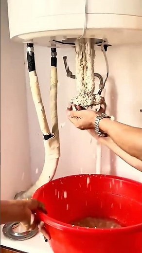 The process of cleaning a water heater from scale