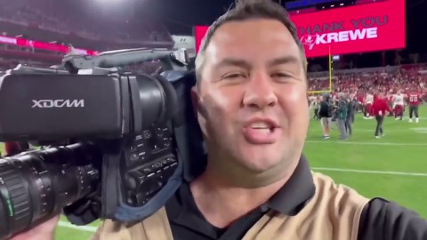 Marc Davis on the field after Commanders win over Buccaneers