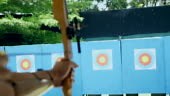 Archer Shooting Bow in Slow Motion Shot
