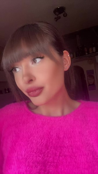 Cozy Indoor Looks: Style with a Pink Fuzzy Sweater