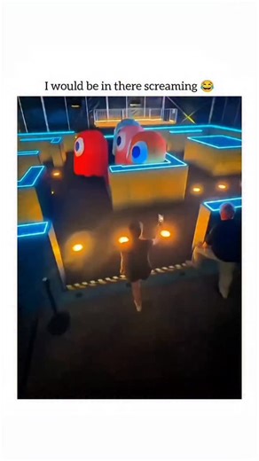 humourjoyusa on Instagram: "This video shows a real-life, immersive Pac-Man experience where a player navigates a neon-lit maze, just like in the classic arcade game. Here’s a breakdown of what’s happening: The Setup The Maze: A life-sized arena with glowing blue and yellow neon walls, designed to look exactly like a Pac-Man level. The Pellets: Instead of digital dots, there are physical lights on the floor that the player "collects" as they walk over them. The Ghosts: Large, inflatable versions