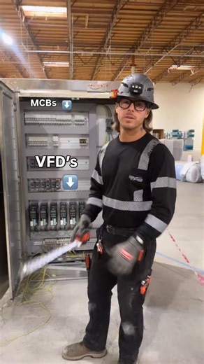 San Diego Electrician on Instagram: "Ever wonder what’s inside a Siemens industrial control panel? ⚡️ The main breaker shuts down the whole panel (NEC 409.21). Each machine has its own branch breaker feeding a motor drive. The row of black modules on the bottom are VFDs (Variable Frequency Drives) that let us adjust motor speed, torque, and efficiency. Because this panel is within sight of all the equipment, the branch breakers double as the disconnects for each machine (NEC 430.102) — as long a