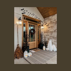 Halloween Porch decor!🎃👻 Comment HALLOWEEN and I’ll send you links to everything!This is one of my favorite Halloween porches I have done! I started with a large rug, I always do a larger rug on the bottom. Then I added a ghost coir mat by the door. Then I added some black branchy trees! These light up two different colors. You can do warm white lights or orange lights! I put the larger trees inside of a planter. Then I added some light up ghost & Halloween wreath! The branch wreath was a perf