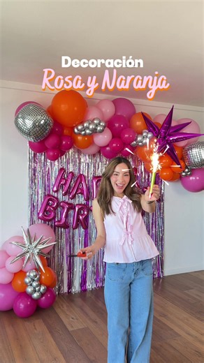 Decoración de cumpleaños rosa y naranja: ideas con guirnalda de globos