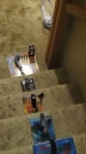 Dominoes falling down the stairs ⬇