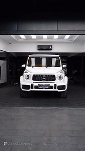 123 reactions · 61 shares | White exterior, Phoenix Ember interior.  This G-Wagon G400d is now a masterclass in dynamic contrast. We didn‘t just change the color; we redefined its character. Watch the transformation #FlinstoneW464 #flinstoneinterior #interior #gclass #g63 #g400d #flinstoneautoparts #benz #car #interiorcar | Flinstone Autoparts | Facebook