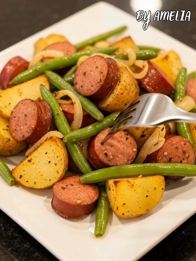 Smoked Sausage, Potato & Green Bean Skillet Ingredients: 1 lb smoked sausage (beef or turkey), sliced into rounds 1 lb baby yellow potatoes, quartered 1/2 lb fresh green beans, trimmed 1 small onion, thinly sliced 2 tbsp olive oil 1 tsp garlic powder 1 tsp paprika 1/2 tsp crushed red pepper flakes (optional) Salt and black pepper to taste Instructions: Cook the potatoes: In a large skillet, heat 1 tablespoon of olive oil over medium heat. Add the potatoes, season with salt and pepper, and cook f