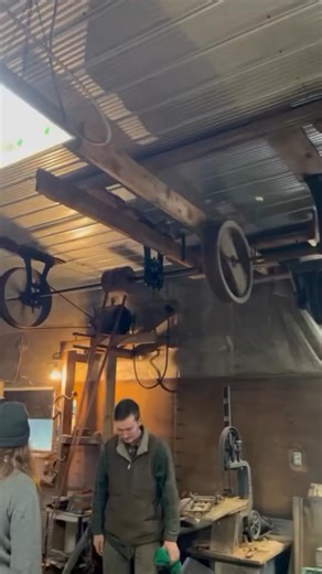 Had the lucky opportunity to witness an old lineshaft shop that hasn’t run since its creator passed away at age 92 about 7 years ago. Many machines ran out of time to get set up, but an impressive array of wooden woodworking machines (tennoner, shaper, tablesaw) were waiting to be put back into service. Thanks to aunt Connie for the videos #castironmachines #flatbelt #lineshaft #woodworking #pulley #steampunk | Cast Iron Machine | Facebook