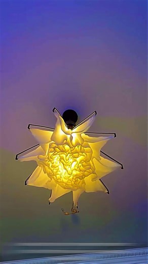 Kinetic Aesthetics in Modern Origami Pendant Lamp