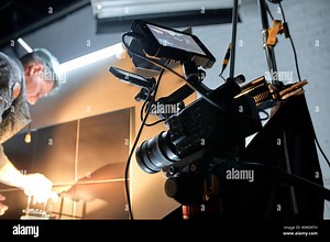 Behind the scenes of filming movies and video products, setting up equipment for shooting video and sound. The concept of producing video content for Stock Photo - Alamy