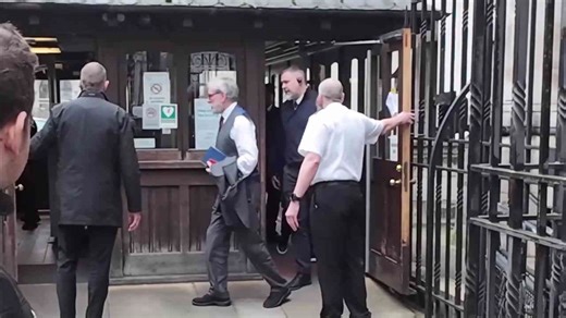 Gerry Adams arrives at court in London glfor IRA bombings civil trial
