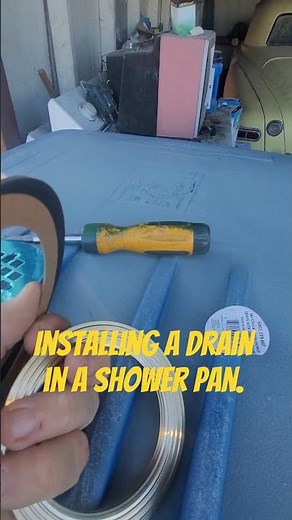 Installing a drain in a new shower pan. #Installingashowerpan #diy