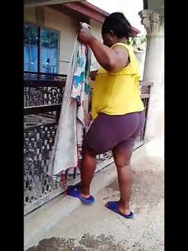 the easiest way an African mom washes her bedspread