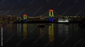 4k Time lapse Sunset of Tokyo City Skyline at Odaiba Tokyo Bridge,Japan.4K UHD time-lapse beach at Odaiba in night with in fast motion-lapse. Tokyo night city landscape. Odaiba district