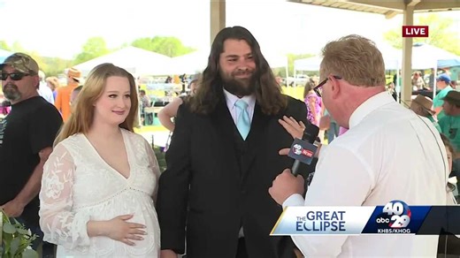 Hundreds marry during the total solar eclipse at Arkansas mass wedding