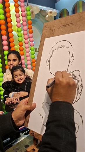 ​"Sketching the beautiful bond between them 🥰🥰🎀 #caricature #artistdrawing #viralreels #drawing