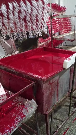 Factory Process: Handling Viscous Red Material