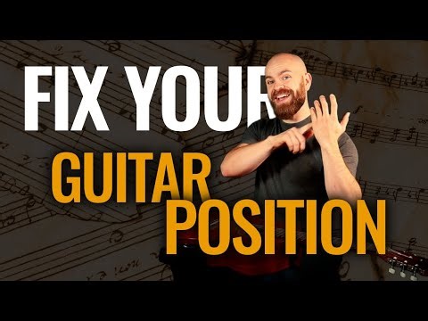 You’re Holding Your Guitar Too Low (Here’s Why It Matters)