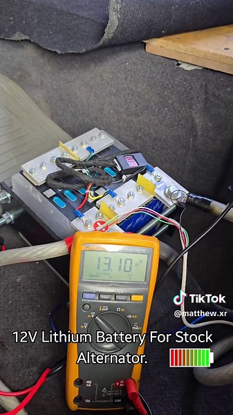 Testing our 12V model batteries, which function perfectly with your stock alternator operating between 13.8 and 14.6 volts. #fyp #fypage #lithiumbatterytesting #lithiumionbatteries #trinicaraudio🔊 #trini_tiktoks #basshead #panasonic #186863641225