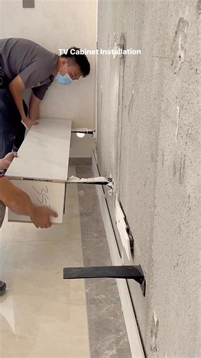 TV Cabinet installation 💫✨ feature wall of the living room with hanging storage • • #Tvwall #featurewall | Tiffany Design Studio