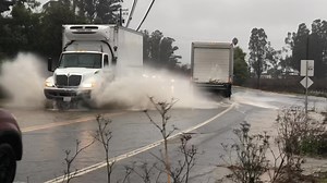Motorists drive through a flooded roadway on Arnold Dr. near Hwy 116 in Sonoma. See the latest updates here: https://www.pressdemocrat.com/article/news/atmospheric-river-north-bay-flooding/ | Press Democrat