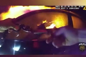 Terrifying footage shows hero cop rescuing fire captain’s daughter from blazing car