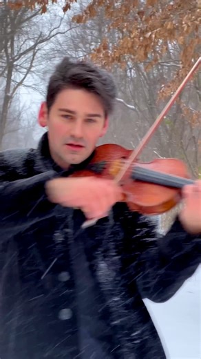 7.9M views · 277K reactions | As snow falls around him, violinist...