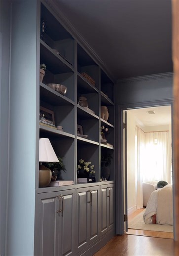 Custom DIY built-ins 🩵 After I painted our door and frame this color… it gave me the confidence to go full color drench. I’ll be posting the full tutorial tomorrow but this is definitely one of my favorite projects to date for our 1926 Tudor. #homeinspo #diyhomeprojects #homerenovation #paintideas #diy