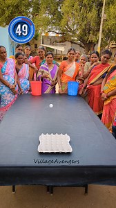 Drop the ping pong balls into the egg tray challenge | Village Avengers