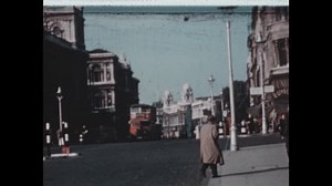 United States CIRCA 1960s: People walking on a London street. Map of England and Scotland, London and oceans labeled. English mile marker in a field.