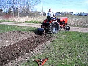 2416 Power King tractor with rototiller