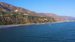 Situated in Malibu’s ultra-private Encinal Bluffs enclave, this stunning, sustainable estate on 1.9 blufftop acres offers panoramic ocean views and direct beach access. In 2009, W3 Architects stripped the original house down to the foundation and spectacularly reimagined and expanded the estate to fuse indoor-outdoor living while maximizing energy efficiency and far-reaching vistas. https://bit.ly/2Gjsx2U | Unique Homes
