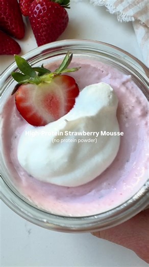 High protein strawberry mousse made with only 3 ingredients! 🍓☁️ 15 grams of protein per serving, no protein powder needed! Ingredients: • 1 cup full fat cottage cheese • 1 cup (150g) fresh strawberries, halved • ¼ cup whipped topping, I used Cocowhip Instructions 1. Add cottage cheese and strawberries to a blender and blend until smooth. 2. Pour into a bowl and gently fold in whipped topping. 3. Place in two containers and let sit in the fridge for 2-4 hours or overnight to set. 4. Enjoy strai