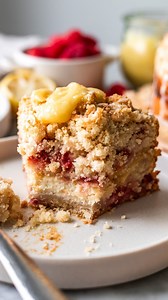 MOIST Vegan Lemon Raspberry Coffee Cake!! With ripples of ‘cream cheese’ & lemon curd, and NO eggs nor dairy needed. We have a zesty “buttery” soft vanilla lemon coffee cake batter studded with juicy raspberries, and filled with layers of dairy free & eggless lemon curd & vanilla cream cheese. Perfectly sweet & tangy in all the right ways. YUM! Comment “raspberry coffee cake” or “recipe please” and I’ll send you the full recipe to your DMs. Or find it on my site thebananadiaries.com. ENJOY!! | T